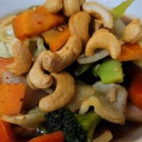 Cashews Stir Fry · Cashew nuts, carrots, bell peppers, broccoli, and onions stir-fried in a brown garlic sauce.