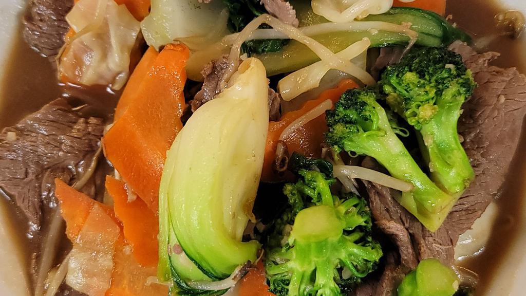 Mixed Vegetable Stir-Fry · For the vegetable lover, our stir-fried broccoli, Bok choy, carrots, cabbage, and bean sprout in our delicious garlic brown sauce.

Picture shown Mix Vegetables stir fry with beef.
