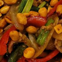 Spicy Peanut - New · Whole peanut, Jalapeños, bell peppers and onions stir-fried in brown garlic sauce.