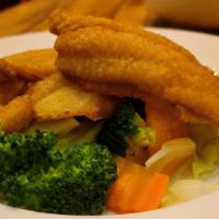 Thai-Style Fried Fish · Crispy pieces of flounder on mixed vegetables covered with your choice of sauce: Thai basil,...