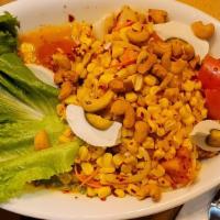 Thai Corn Salad · Sweet corn, carrot, tomatoes, and cashew nuts in Thai style spicy, sweet, and salty salad dr...