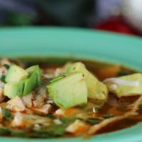 Chicken Tortilla Soup · Tender chunks of grilled Chicken with avocados and cheese. Topped with crispy tortilla strips.