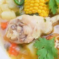 Caldo De Pollo (Chicken Soup) · Shredded chicken, tortilla strips, tomatoes, cilantro, Jack cheese, carrots, squash, avocado...