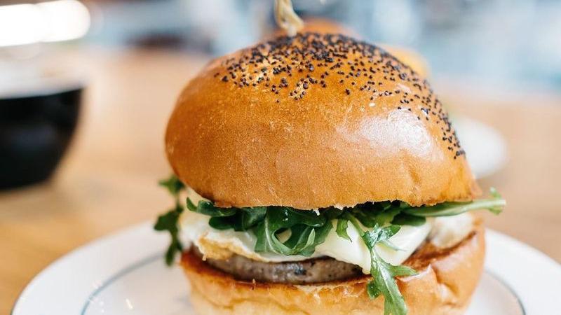 Egg Sandwich · Egg whites, chicken sausage, cheese, spicy mayo, arugula, poppy seed roll.