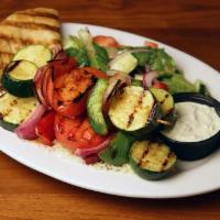 Vegetable Kabob · Served with rice, grilled vegetables, salad, pita bread and tzatziki sauce. Choice of regula...