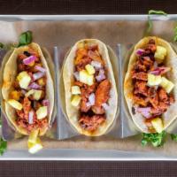 Pork Pastor Mini Street Tacos · Gluten-free. Marinated pork, pineapple, and pico de gallo in three mini corn tortillas.

Con...