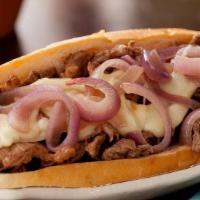 Perfect Philly Cheesesteak Sub With Onion · Fresh Philly meat with sautéed onions.