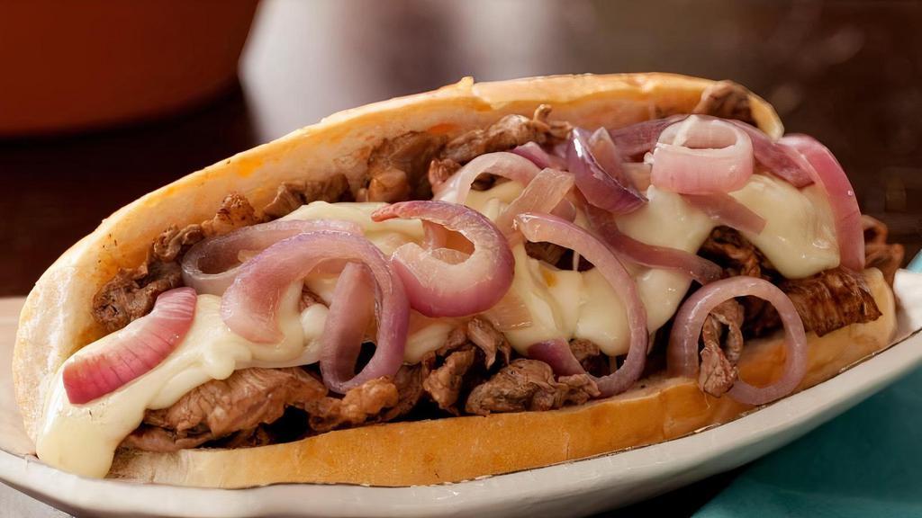 Perfect Philly Cheesesteak Sub With Onion · Fresh Philly meat with sautéed onions.