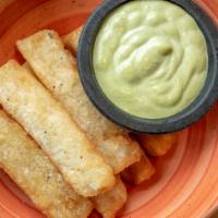Yuca Fries · Served with lime cilantro aioli