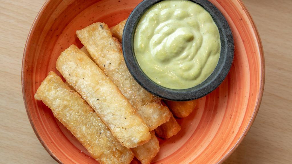 Yuca Fries · Served with lime cilantro aioli