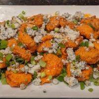 Buffalo Popcorn Shrimp · Fried popcorn shrimp tossed in . Goose's hot buffalo sauce, sprinkled with blue-cheese crumb...