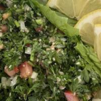 Tabbouli · Vegetarian, Dairy- Free. Finely chopped parsley, tomatoes, green onion, fresh mint, cracked ...