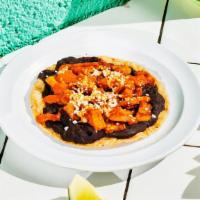 Black Bean Y Sweet Potato Taco. · Refried black beans topped with roasted sweet potatoes, queso fresco and dried chile salsa. ...