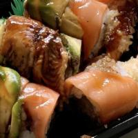 Samurai Roll · Shrimp tempura rolled inside, topped with eel, smoked salmon and avocado in eel sauce.