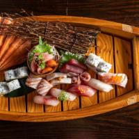Sushi & Sashimi Combo A · Six pieces sushi, nine pieces sashimi and one California roll.