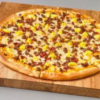 Breakfast Pizza · Whole milk mozzarella, cheddar cheese sauce, breakfast sausage, bacon, & eggs