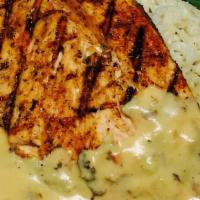 Free Range Chicken Breast · Grilled and served with a maple dijon glaze and garlic mashed potatoes.