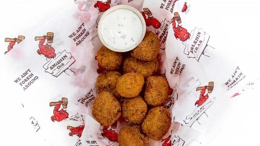 Hush Puppies · Deep fried dough that is made from cornmeal batter with extra seasonings