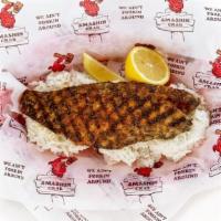 Redfish Basket · Cajun grilled redfish served with steamed rice