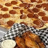 Family Special · One large one-topping pizza and 12 yummy wings. Comes with 2 sides of dipping sauce