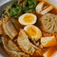Spicy Ramen  Soup · lSpicy Ramen Noodle soup wotj pork belly, tofu , egg ,  a beef dumpling, a chichen dumpling,...