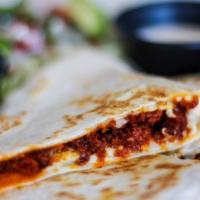 Quesadilla With Al Pastor · Cheesy heaven. Flour tortilla, al pastor adobo pork, and mixed cheese. Served with a side of...