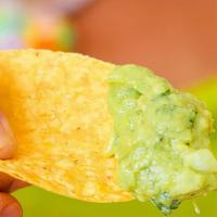 Chips & Guacamole · 4 oz side of fresh guacamole with chips.