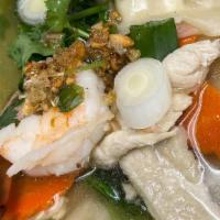 Dumpling Soup · Combined chicken and vegetable dumpling in a savory broth with chicken and shrimp.