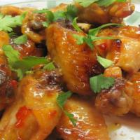 Pinto Wings (6 Pcs.) · Spicy. Crispy chicken wings tossed with sweet chili sauce.