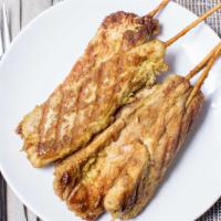 Chicken Satay (4 Pcs.) · Gluten-free. Marinade chicken threaded onto skewers and grilled. Served with homemade peanut...