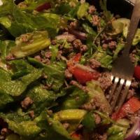 Larb Salad · Spicy. Ground chicken or pork with onions, scallions, cilantro and roasted rice powder in a ...