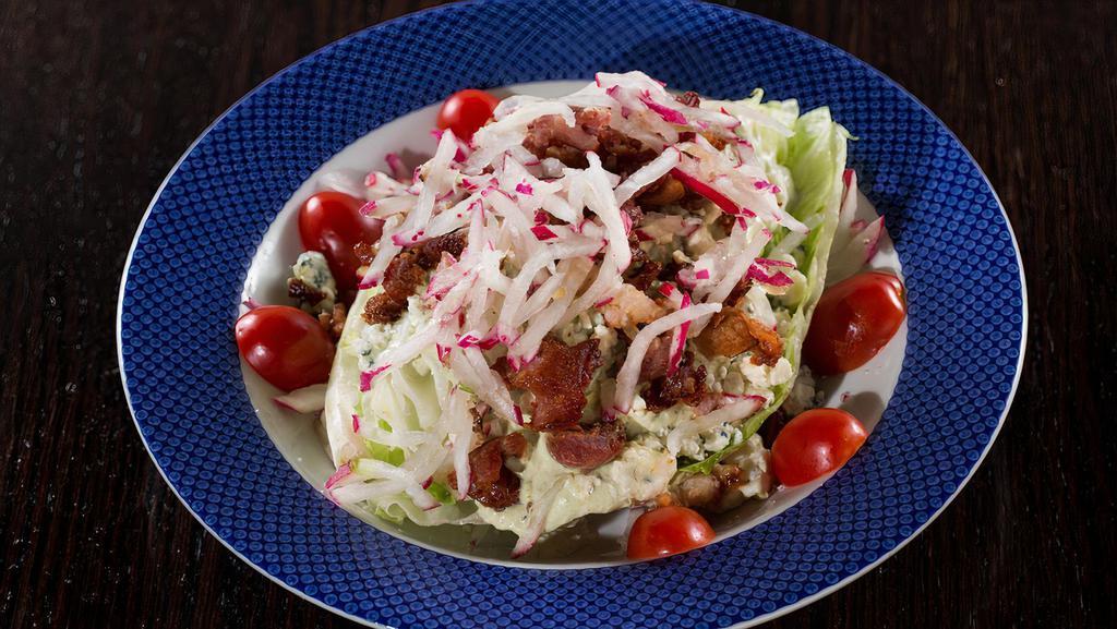 Blt Wedge · Iceberg, bacon, grape tomatoes, radishes, blue cheese crumbles, and green goddess dressing.