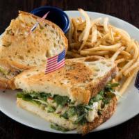 Chicken Sandwich  · Grilled chicken breast, basil aioli, havarti cheese, roasted red peppers, arugula, and ciaba...