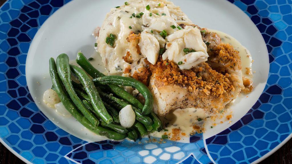 New England Cod · Cracker-crusted cod, jumbo lump crab meat, mashed potatoes, and tarragon butter sauce.