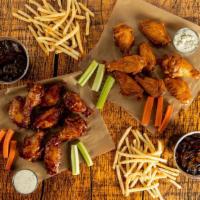 Traditional 16-Count Party Pack · 16 count order of traditional wings tossed in up to 2 different flavors or naked with up to ...