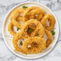 Onion Stopper · Sliced onions dipped in a light batter and fried until crispy and golden brown.