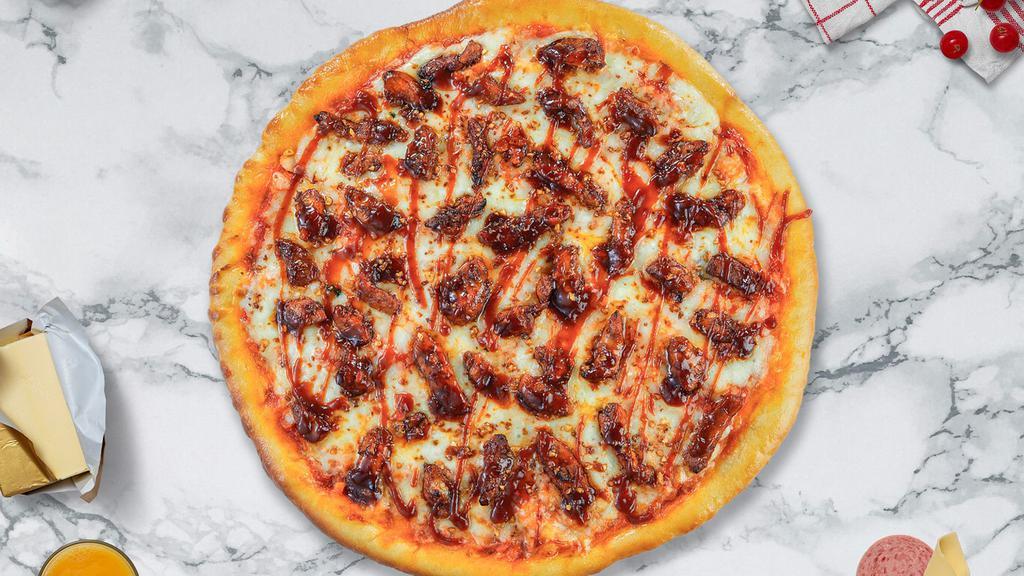 Chicken Grill Bbq Pizza · Barbecue sauce, juicy chicken, mozzarella, marinara, chopped garlic, fresh basil, and extra virgin olive oil baked on a hand-tossed dough.