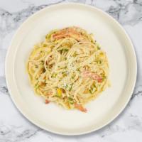Shrimp In White Pasta (Linguine) · Linguine served with a creamy white sauce with shrimp, white wine, lemon juice, red pepper f...