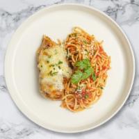 Golden Chicken Parm Pasta (Spaghetti) · Freshly baked chicken parmesan served with rossa (red) sauce spaghetti and drizzled with par...