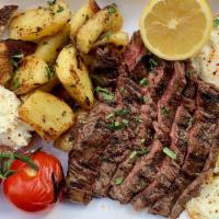 Dad'S Steak & Eggs · sautéed skirt steak, home fries, two fried eggs, blistered tomatoes, goat cheese, and butter...