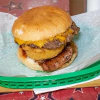 Texan Burger · BBQ sauce, Cheddar cheese, pickles, smoked sausage, & onion ring.