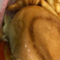 Kids' Burger · Mayo, mustard, lettuce, tomato, pickles, & onions served with fries and a drink.