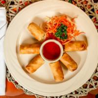 Crispy Spring Rolls · Combination of cellophane noodles, carrot, cabbage, celery and Chinese black mushroom. Serve...