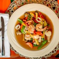 Phuket Seafood  🌶 · Shrimp, scallop and calamari sauteed with ginger, celery, snow pea, carrot, zucchini and fre...
