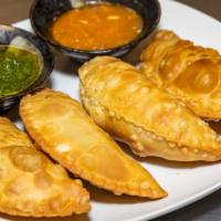 4 Count Empanadas · Comes with your choice of 4 sauces. (substitute oxtail + $2.00 each)