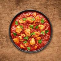Chicken Vulcan Vindaloo  · A special from the coastal state of Goa, boneless morsels of chicken, slow cooked in a hot a...