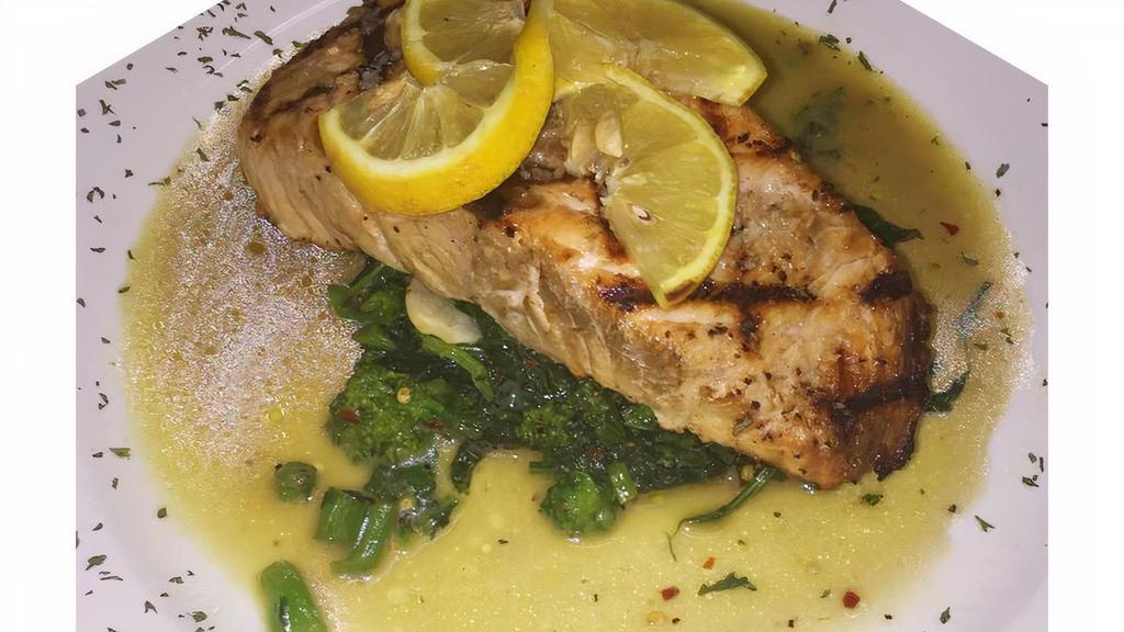 Salmon Alla Rivera · Garlic, rosemary, butter and lemon in a white wine sauce.