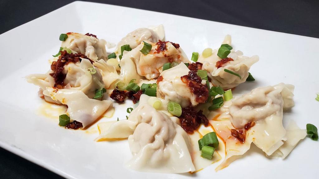 Canton Spicy Wonton (8Pcs) · Steamed wontons chicken fillings. Spicy Garlic sauce