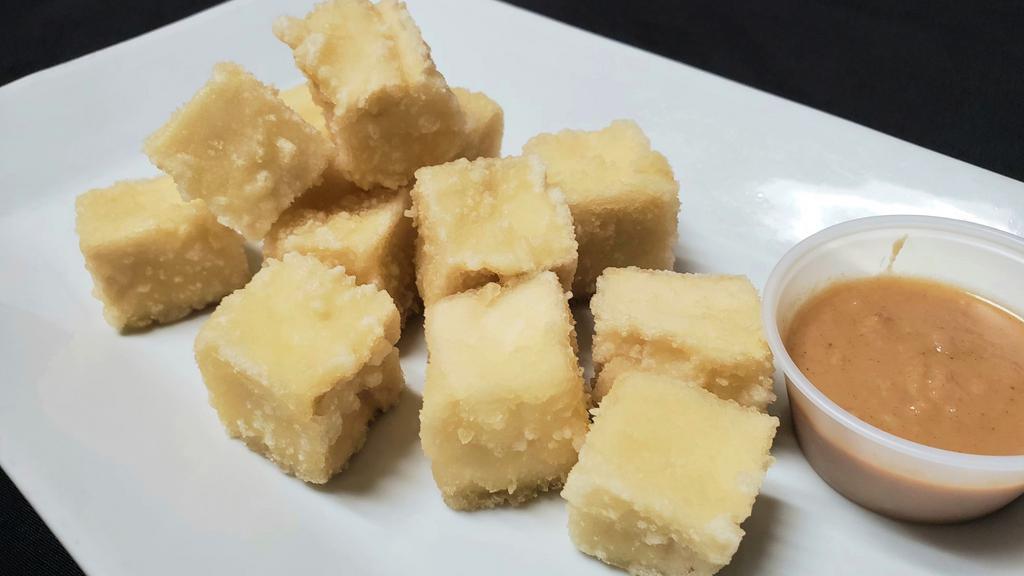 Thai Crispy Tofu · Fried Japanese tofu. Peanut sauce