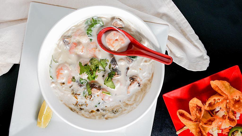 Tom Kah With Coconut Milk · Vermicelli noodles, thai chili soup, shitake mushrooms, white mushrooms, basil, lemon grass, lime juice and cilantro. HAS COCONUT MILK